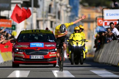 Tadej Pogačar takes a victory bow at Paris-Nice